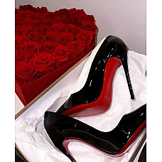 Christian Louboutin Black Patent Leather Pumps