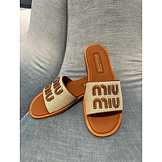 Miu Miu Canvas and Leather Slides