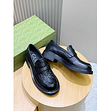 Gucci Loafers with an Embossed GG Logo Pattern