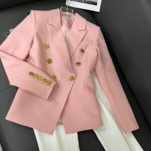 balmain pink double breasted blazer and white flared trousers